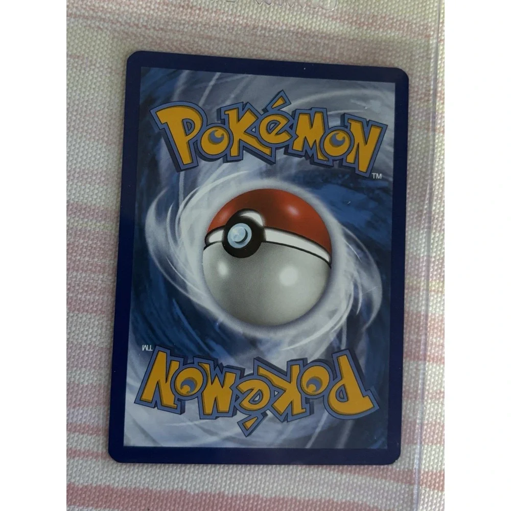 Pokémon TCG Machamp 65/145 Cosmos Holo rare card from the 2017 Guardians Rising
